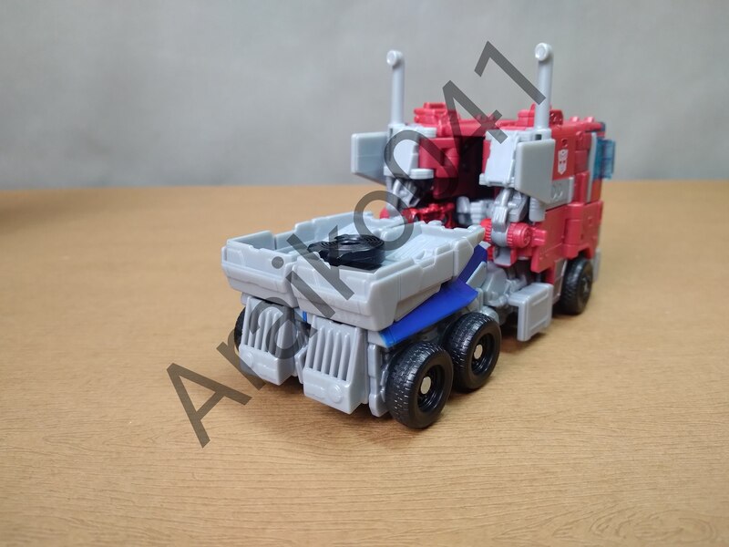 In Hand Image Of Transformers Rise Of The Beasts Mainline Optimus Prime Voyager Toy  (6 of 10)